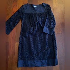 Navy blue eyelet dress. 3/4 length sleeve. Side zip closure. Size 4